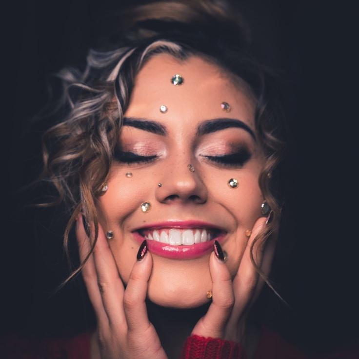 Kaveri Mehta, Lead Design Curator at Quanta Vision Layer, reviewing corporate floral arrangements